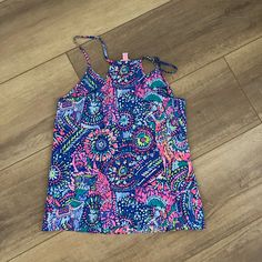 Lilly Pulitzer Multicolor Silky Tank Top. New Without Tags. Purple Stretch Summer Tops, Stretch Purple Summer Tops, Stretchy Purple Summer Top, Casual Purple Tops For Beach Season, Summer Printed Purple Tops, Purple Printed Summer Top, Summer Purple Printed Tops, Trendy Purple Top For Beach Season, Casual Purple Tank Top With Floral Print