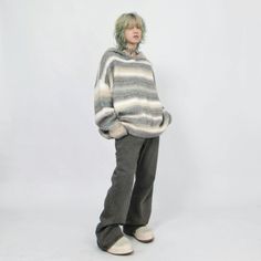 Elevate your casual wardrobe with the effortless charm of our Oversized Pastel Striped Ribbed Hem Hoodie Sweater. Crafted with a focus on comfort and style, this cozy sweater features a laid-back oversized fit, perfect for those who appreciate a relaxed silhouette. Soft pastel stripes provide a subtle pop of color, while the ribbed hem and cuffs add a touch of texture and keep the warmth in, making this hoodie an indispensable piece for cooler days. The versatile nature of this hoodie sweater makes it ideal for various occasions, from weekend outings to casual workdays. Pair it with your favorite jeans for an easygoing look or layer it over a collared shirt for a smart-casual ensemble. Its understated design ensures a timeless addition to your casualwear collection. Product specifications: Cozy Relaxed Fit Sweater For Cold Weather, Casual Chunky Knit Winter Sweatshirt, Casual Chunky Knit Sweatshirt For Winter, Cozy Knit Sweatshirt For Streetwear, Oversized Chunky Knit Sweater For Streetwear, Casual Chunky Knit Sweatshirt, Comfy Gray Winter Sweater, Casual Chunky Knit Sweater For Loungewear, Winter Hoodie With Relaxed Fit And Soft Texture