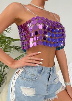 Expertly designed for maximum style and comfort, our Backless Acrylic Camisole Crop Top features a metallic sequin design in a stunning purple shade. The backless design adds a touch of allure, making it the perfect addition to your wardrobe. Elevate any outfit with this must-have piece. Fabric: Non-Stretch Material: Acrylic Fiber Summer Sequined Backless Halter Top, Sequined Backless Halter Top For Summer, Backless Sequined Halter Top For Summer, Purple Summer Crop Top For Parties, Strapless Sequined Crop Top For Summer, Summer Purple Sequined Tops, Purple Camisole Tank Top For Party, Purple Tank Top With Built-in Bra For Summer, Purple Sleeveless Tank Top For Party