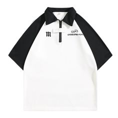 a white and black polo shirt with the m logo on it