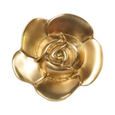 a golden rose shaped object on a white background