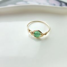 Dainty Green Jade Eye Ring 14K Gold Filled Sterling Silver | Etsy Dainty Gold Ring With Emerald, Dainty Gold Rings With Emerald, Adjustable Gold Stackable Emerald Ring, Adjustable Stackable Gold Emerald Ring, Dainty Wire Wrapped Rings For Gifts, Dainty Wire Wrapped Rings As Gift, Adjustable Yellow Gold Emerald Ring Gift, Adjustable Yellow Gold Emerald Ring As A Gift, Hand Wrapped Crystal Promise Ring