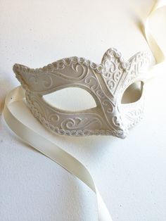 Simple and elegant, this mask is perfect as a part of Carnival, Halloween, Masquerade, or Mardi Gras party costume or could just be an amazing addition to your collection. S H I P P I N G - Processed same day or within 24 hours. 1-2 day guaranteed delivery services offered, add items to cart and click on shipping tab for rates. Pls leave a check out note with your need date & contact number (especially for expedited and custom orders) Msg for delivery time frames (Include your state/country) Elegant White Masquerade Mask For Carnival, Elegant White Masquerade Mask For Mardi Gras, White Masquerade Mask For Halloween, White Mardi Gras Masquerade Masks, White Mardi Gras Masks And Prosthetics For Gift, White Mardi Gras Masks And Prosthetics, White Party Masks For Carnival, White Masks For Carnival Party, White Masks And Prosthetics For Mardi Gras Gift