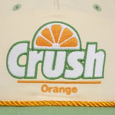 Dive into retro vibes with this white Orange Crush grandpa snapback cap. This classic cap, featuring a green bill and the iconic soda logo, is a statement piece that blends nostalgia with style. Crafted from cotton ripstop fabric, the hat boasts rope detailing and an adjustable snapback closure for a perfect fit. Officially licensed, this cap ensures authenticity in your retro collection. Maintain its quality with a simple hand wash in cold water and lay flat to dry. Elevate your hat game with t Retro Baseball Cap With Letter Patch, Retro Green Baseball Cap With Letter Print, Green Retro Baseball Cap With Letter Print, Retro Cotton Hat With Embroidered Logo, Retro Cotton Snapback Hat, Retro Cotton Baseball Cap, Retro Dad Hat With Letter Print, Retro Cotton Dad Hat With Embroidered Logo, Retro Baseball Cap With Embroidered Logo