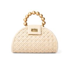 Welcoming the new cream and gold BELLA bag. Small but mighty, this gorgeous bag is the perfect statement piece for your vacation style You can still fit your essentials in including your large phone. You can still fit your essentials in including your large phone. Crafted by our artisans in the Philippines, the structured bag is made from T’nalak fabric with an iconic Solihiya rattan weave overlay. Featuring a gold plated brass twist lock clasp and a wooden beaded top handle. Detachable cross-bo Luxury Beige Straw Bag With Gold-tone Hardware, Beige Straw Bag With Gold-tone Hardware And Top Handle, Beige Top Handle Straw Bag With Gold-tone Hardware, Natural Color Bags With Bamboo Handle For On-the-go, Natural Bags With Bamboo Handle For On-the-go, Elegant Straw Tote Bag For On-the-go, Luxury Natural Straw Bag With Gold-tone Hardware, Elegant Straw Bag With Gold-tone Hardware For Everyday Use, Elegant Straw Bag With Gold-tone Hardware For Daily Use