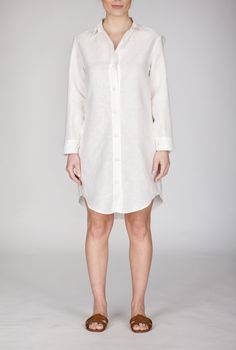 Meet the Mary Shirt Dress: a chic reinterpretation of the classic button-down silhouette that keeps you looking cool and stylish. Its relaxed fit is enhanced by dropped shoulders, while the distinctive back pocket adds a unique touch. Adjustable sleeves and fabric-covered buttons bring sophistication, all tailored from a linen-cotton blend for breathable, effortless style. Pair it with your favorite espadrilles or sandals for an on-the-go look that is both comfortable and elegant. This collectio Classic Collared Shirt Dress For Day Out, Summer Daywear Shirt Dress With Button Cuffs, Summer Shirt Dress With Button Cuffs For Daywear, Summer Relaxed Fit Shirt Dress With Button Cuffs, Elegant Button-up Shirt Dress With Rolled Sleeves, Spring Shirt Dress With Button Cuffs And Relaxed Fit, Elegant Shirt Dress With Shirttail Hem For Work, Classic Shirt Dress With Spread Collar For Day Out, Chic Shirt Dress With Button Cuffs For Daywear