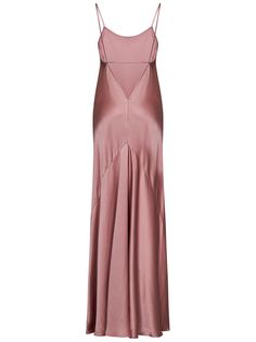 a women's pink dress with spaghetti straps on the bottom and side, in satin fabric