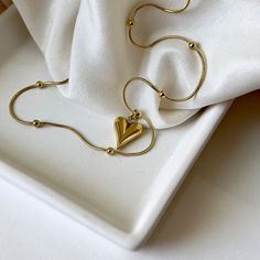 This exquisite A Heart of Gold Necklace is the ultimate token of affection. Crafted from hypoallergenic materials and dipped in 18k gold, this dainty and feminine jewelry piece is a luxurious treat for any woman. With its lightweight design, it'll be just the perfect gift for any special occasion. ☆Waterproof gold neck Dainty Luxury Jewelry With Polished Finish, Luxury Dainty Jewelry With Polished Finish, Luxury Elegant Necklace As A Gift For Mom, Luxury Delicate Jewelry For Valentine's Day, Delicate Luxury Gold Jewelry, Luxury Graceful Jewelry For Gift, Luxury Dainty Everyday Jewelry, Luxury Handmade Jewelry As A Gift For Her, Luxury Handmade Jewelry For Gift