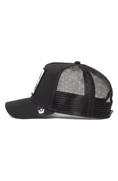 An embroidered patch fronts a classic trucker hat constructed with breathable mesh paneling at the sides and back. Adjustable snapback strap 57% polyester, 43% cotton Spot clean Imported The Black Sheep, Fisherman's Hat, Goorin Bros, Visor Cap, Black Sheep, Canvas Backpack, Black Logo, Embroidered Patch, Black Nylons