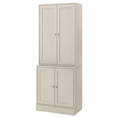 a tall white cabinet with two doors