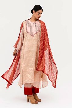 Red full sleeves linen tissue straight kurta with all over texture, mirror bloom embroidered yoke and leheriya detailing on the sleeves. Paired with an ombre silk pant and leheriya pattern dupatta and an inner. - Aza Fashions Festive Raw Silk Kurta With Embroidered Sleeves, Spring Festive Linen Kurta, Spring Kurta With Dupatta In Raw Silk, Bollywood Style Straight Kurta Set With Embroidered Sleeves, Spring Raw Silk Kurta With Dupatta, Cotton Silk Traditional Wear With Embroidered Sleeves, Long Sleeve Cotton Silk Kurta With Embroidered Sleeves, Traditional Cotton Silk Wear With Embroidered Long Sleeves, Traditional Wear With Embroidered Long Sleeves In Cotton Silk