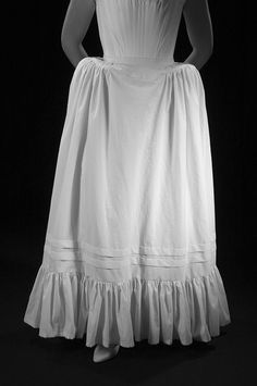 The 17th century petticoat is a full petticoat gathered onto a small yoke. This petticoat is designed to be worn with the 17th century bum roll (as seen in photos here) or by itself. The 17th century petticoat has a 10” ruffle, and includes two tucks for altering the length. It features Ruffled Skirt Petticoat For Costume Party, Cancan Petticoat Skirt For Costume Party, Cancan Petticoat For Costume Party, Ruffled Tiered Petticoat For Costume Party, Ruffled Tiered Skirt Petticoat For Costume Party, Tiered Ruffle Petticoat For Costume Party, Costume Petticoat With Tiered Skirt, Summer Full Skirt Petticoat For Costume Party, Costume Full Gathered Skirt