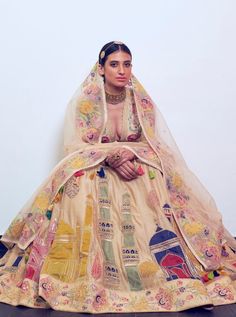 Editor's Note This set features a beige and multicolor chanderi handloom and organza Lehenga with blouse and dupatta. Color: Beige; Multicolor Fabric: Chanderi Handloom; Organza Care: Dry Clean Only About the Designer RAR Studio brings to the label an amazing mix of fashion and retail marketing which helps them understand the market better and serve the consumer with designs that truly stand out. Their expertise in graphics, prints, textile weaves, garment construction, embroideries, and surface Navratri Anarkali Set With Sheer Dupatta In Tussar Silk, Semi-stitched Multicolor Lehenga With Sheer Dupatta, Bollywood Style Tussar Silk Sets With Sheer Dupatta, Anarkali Tussar Silk Lehenga With Gota Work, Designer Cotton Silk Cream Dupatta, Designer Cream Cotton Silk Dupatta, Bollywood Style Multicolor Cotton Silk Anarkali Set, Beige Cutdana Anarkali Set For Festivals, Multicolor Bollywood Anarkali Set In Cotton Silk