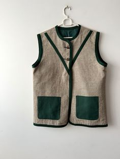 Vintage Large size Women's German Bavarian Vest Linen blend wool Loden Vest Traditional Folk Tyrolean Oktoberfest Vest Long Drindl vest Label size: 40 Estimated size: L Measurements (lying flat): Length: 28.5"/ 72.5 cm Pit to pit: 22"/ 56 cm Shoulders: 17.5"/ 44.5 cm Please check measurements to insure a proper fit. Remember to allow yourself some extra room for movement. You can compare these with something from your closet that fits you well. This vest will come to you freshly laundered and re Ash Costume, Vest Linen, Gilet Long, Vest Outfits, Extra Room, Label Sizes, Latvia, Womens Vest, Linen Blend