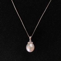 New With Tag And Flawless - Stored In Jewelry Box, Never Worn. Purchased In Store Directly From The Fine Jewelry Section At Macy’s. Does Not Come With Original Packaging, But Will Be Packed Safely For Shipment. This Is An Absolutely Beautiful Pendant. The Pearl Is Lustrous And A Nice Size To Wear As A Pendant Alone. Unfortunately I Haven’t Made Use Of It. Pearl Size: 12mm (L) X 10mm (W) Pendant Overall Length (Including Bail) : 20mm Delicate 18” 14k White Gold Box Chain. 6 Diamonds Set At Crown Formal Akoya Pearl Necklace With Pear Shape, Formal Akoya Pearl Pear-shaped Necklace, Formal Akoya Pearl Pear Shaped Necklace, Formal Pear-shaped Akoya Pearl Necklace, Elegant White Necklace With Pearl Pendant, Pearl White Briolette Necklace For Formal Occasions, Elegant White Pearl Pendant Necklace, Luxury White Pear-shaped Necklace, Elegant White Round Pendant Necklace