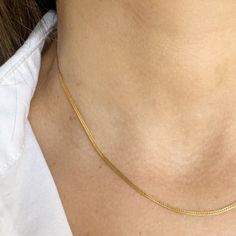 The Herringbone Essential Chain is a true classic with its bent metal pieces forming a herringbone pattern. A delicate shimmer and feminine feel, make this necklace a must have for any jewelry collection. - 16-18 inches & super versatile. 18 inches is a true classic length or wear it closer to 16 inches for a shorter style, sitting closer to the base of the neck. - all pieces are 14K Gold filled (For more information on our metals click HERE!) Elegant Everyday Herringbone Necklace With Delicate Chain, Classic 14k Gold Herringbone Necklace With Delicate Chain, Gold Plated Herringbone Necklace With Delicate Chain, Dainty Everyday Tarnish-resistant Herringbone Necklace, Minimalist Gold-plated Herringbone Necklace With Delicate Chain, Herringbone Pattern, Ring Bracelet, Earring Necklace, Modern Classic