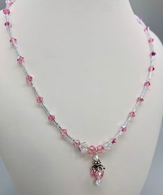 Rose Pink is one of October Birthstones. Swarovski Crystal Necklace. Sterling silver lobster claw clasp. Handmade in Brooklyn. Matching Earrings Available. A great birthday gift or treat Yourself! I started making my own Jewels at our kitchen table almost 30 years ago. Now at 68 years old and saving for retirement most evenings you will find me at my desk in our living room creating jewels after a day of Zoom calls. Feeling grateful that  I can still create Jewels that are a pleasure to look at Crystal Necklaces With Round Beads For Gifts, Gift Crystal Necklaces With Round Beads, Pink Sparkling Stones Jewelry Gift, Pink Jewelry With Sparkling Stones For Gift, Pink Sparkling Stones Jewelry For Gifts, Crystal Necklaces With Faceted Beads For Gifts, Beaded Jewelry For Birthday On Valentine's Day, Pink Birthstone Jewelry For Birthday, Beaded Jewelry For Anniversary On Valentine's Day