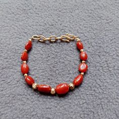 Red Coral Bracelet, 100% Natural Italian Red Coral Bracelet, Red Coral Handmade Charming Bracelet, Best Quality Smooth Beads Bracelet... Gemstone : Natural Red Coral  Bracelet Weight : 41 Carat   Bracelet Length;- 7 Inches  Color : As Seen In Picture Payment policy We accept the payment via PayPal only. Shipping policy We Ship the item as per our shipping policy once we receive the payment. We understand that getting your items quickly is important to you, so we make every effort to process your Red Beaded Bracelets With Gemstone Beads, Red Coral Bracelet With Polished Beads As A Gift, Red Oval Beaded Bracelets For Gift, Red Polished Beads Bracelet As Gift, Oval Faceted Beads Bracelets As Gift, Red Oval Beads Jewelry For Gift, Red Coral Beaded Bracelets With Polished Beads, Red Bracelets With Spacer Beads As Gift, Red Coral Bracelets With Polished Beads As A Gift