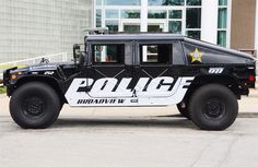 a police vehicle parked in front of a building