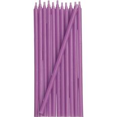 purple candles are lined up on a white background