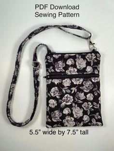 a black and white flowered purse on a white background with the measurements for it