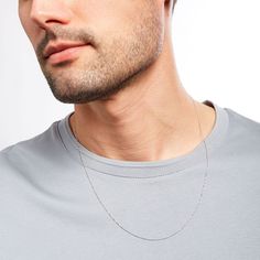 Enjoy a versatile design that complements every style and occasion - this simple and elegant white gold Singapore chain necklace from the Made in Italy Collection. Crafted in 14K white gold This 1.0mm-wide Singapore chain is certain to become your favorite go-to look. Lovely worn alone or layered with other chains, necklaces and pendants This necklace adjusts up to 22.0 inches in length with a sliding bead extender and secures with a lobster claw clasp. Minimalist White Box Chain Necklace, 14k Gold Silver Chain Necklace With Delicate Chain, 14k Gold Delicate Chain Necklace In Silver, White Gold Sterling Silver Rolo Chain Necklace, 14k Gold Delicate Silver Chain Necklace, White Gold Sterling Silver Cable Chain Necklace, Minimalist White Gold Chain Necklace For Formal Occasions, Classic 14k White Gold Chain Necklace, Classic White Gold 14k Chain Necklace