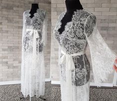 Off-white luxurious wedding robe, to add a perfect touch to your perfect and unique day. Only high quality fabrics and high finishing used for making the robe as neat as it can be. Please find the wedding robes collection here https://www.etsy.com/shop/LidiasBoutiqueDesign?ref=seller-platform-mcnav&section_id=25023222. For wedding dresses, please access https://www.etsy.com/shop/LidiasBoutiqueDesign?ref=seller-platform-mcnav§ion_id=23157290. For wedding tops and boleros, please access https: Sheer Lace Wedding Night Gown, Elegant Lace Gown For Wedding Night, Feminine Lace Wedding Robe, Long Lace Robe For Wedding Night, Elegant Lace Bridal Gown, Elegant Bridal Lace Gown, White Lace Wedding Nightgown, Lace Patchwork Gown For Wedding Night, White Lace Nightgown For Wedding