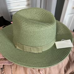 New With Tags M/L Circumference: 57 - 58 - Brim: 3" Adjustable Green Panama Hat, Green Fedora With Curved Brim For Vacation, Green Flat Brim Fedora For Beach, Green Wide Brim Fedora For Vacation, Lightweight Short Brim Boater Hat For Spring, Green Bohemian Fedora For Summer, Green Curved Brim Fedora For Vacation, Chic Fedora For Spring, Lightweight Boater Hat With Short Brim For Spring