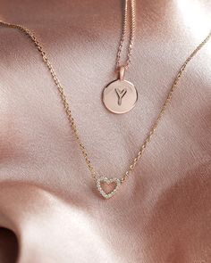 Our open heart pendant is a timeless expression of love. It’s the sweetest gift for yourself or for someone you hold close to show them just how much you care for them. With sparkling cubic zirconia and a dainty chain, this piece is perfectly flirty and feminine. 14KT yellow, rose or white gold platedAAAAA Cubic ZirconiaMeasurements: Diameter: 8mm (.3”)Chain length: 18”+2” extender