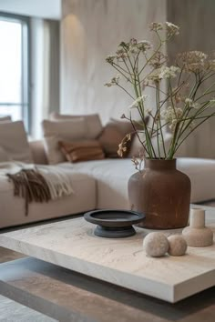 How To Style A Square Coffee Table: Centerpiece Ideas Square Coffee Table Styling Modern, Coffee Table Elegant, Coffee Table Minimalist Decor, How To Style Square Coffee Table, Style A Square Coffee Table, Style Square Coffee Table, Coffee Table Aesthetic Decor, Square Coffee Table Styling Living Rooms