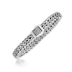 A box style lock accented with pave set white sapphires shows off the elegance of this braided men's bracelet. Crafted in fine sterling silver and available in 7 1/2 inches and 8 1/4 inches. Bracelet Information Chain Type wheat Clasp Type box-with-tongue Width 0.28 inches Setting Type prongs Avaliable Sizes 7.5 inches - 8.25 inches Metal 925 Sterling Silver Gemstone Information Stone Type White Sapphire Shape Round Mens Sterling Silver Bracelets, Silver Necklace Designs, Braid Jewelry, Sapphire Stones, Trending Necklaces, Earring Trends, Black Diamond Ring Engagement, Black Sapphire, Jewelry Fashion Trends