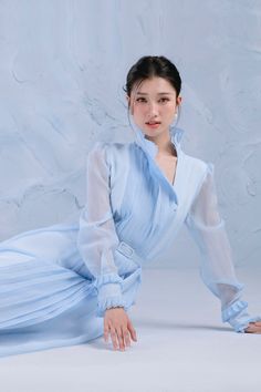 Women's Wind Shirt Long Sleeved Organza Midi Dress S/M/L Blue MEAN BLVD Winter Pleated Long Sleeve Dress, Long Sleeve Pleated Midi Dress For Winter, Pleated Long Sleeve Midi Dress For Winter, Winter Pleated Long Sleeve Midi Dress, Elegant Daywear Dress With Stand Collar, Chic Pleated Long Sleeve Dress For Winter, Chic Long Sleeve Light Blue Dress, Elegant Long Sleeve Midi Dress With Folds, Elegant Long Sleeve Pleated Dress