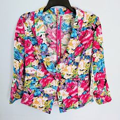 Brand New With Original Tags. No Flaws. No Rips, Stains, Fraying Or Pilling. Spacegirlz Brightly-Coloured Floral Blazer, Made Of Stretchy, Flexible Material. Pointed Front Tails, Rounded Collar. Single Button Closure. Semi-Cropped Length, See Measurements. Womens Size Medium Machine Washable Measurements: 18 Inch Bust 21 Inch Length + 2 Inches On The Front Tails 17.5 Inch Sleeve Length Don't Like The Price? Bundle This Item With Any Other Items Under The 5/$30 Tag To Get The Discount, Or I'm Ope Spring Party Blazer With Floral Print, Multicolor Fitted Spring Blazer, Fitted Multicolor Spring Blazer, Spring Multicolor Fitted Blazer, Fitted Multicolor Blazer For Spring, Spring Party Outerwear With Floral Print, Trendy Multicolor Summer Blazer, Multicolor Casual Spring Blazer, Fitted Multicolor Outerwear For Day Out