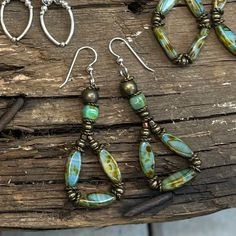 These Earrings Have Such Pretty Earthy Colors And A Boho Vibe! They’re Lightweight And Have Great Movement. They’re Made With Antiqued Brass And Aqua, Blue, Green And Brown Beads Then Finished Off With .925 Sterling Silver Ear Wires. They’ve Been Sealed And Polished With Renaissance Jewelry Wax To Keep Them Looking Beautiful For A Long Time! *No Two Pieces Will Ever Be Completely Identical As Each Piece Is Made By Hand. Handmade Items Have Natural Imperfections As They Are Not Mass Made. Please Affordable Handmade Bohemian Jewelry, Cheap Bohemian Jewelry With Dangling Beads, Cheap Handmade Bohemian Beaded Earrings, Handmade Beaded Jewelry Novica, Cheap Bohemian Beaded Earrings As Gift, Handmade Jewelry Greatergood, Cheap Artisan Beaded Earrings, Cheap Artisan Jewelry With Dangling Beads, Earrings Handmade Boho Vintage