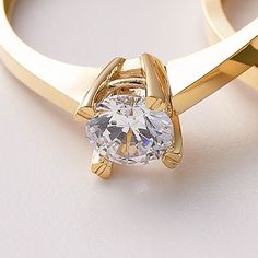 Solitaire Ring 10k 14k 18K Solid Gold/ Special Design Gold Engagement Ring For Her / Handmade Solitaire Fine Jewelry / A+ Cubic Zirconia / Nature Friendly Gift Package 💎 Stone Shape: Round 💎 Stone Cut: Brilliant 💎 Stone Color: DEF Grade 💎 Stone Clarity: VS1 - VVS 💎 Stone Size: 5mm A solitaire ring refers to any piece of jewelry with a single gemstone. A+ cubic zirconia solitaire rings have come to mark some of the most significant occasions in one's life, like sweet-sixteen, anniversaries, and the most notable, an engagement proposal. Traditionally, the solitaire symbolizes the commitment and fidelity between a couple. For this reason, it has become greatly associated with engagements and commitment rings. If you do want to incorporate a solitaire into your wedding  you may get it as Brilliant Cut Cubic Zirconia Couple Rings As Gift, Couple Rings With Brilliant Cut Cubic Zirconia, Elegant Couple Rings With Prong Setting For Gift, Luxury Brilliant Cut Couple Rings For Gift, Elegant Couple Rings With Prong Setting, Diamond White Couple Rings With Diamond Cut For Gift, Gold Moissanite Jewelry For Promise, Gold Moissanite Promise Jewelry, Gift Ring With Single Diamond In Cubic Zirconia