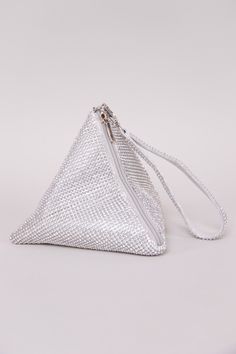 The perfect evening bag when you're feeling glamorous! The Rhinestone Triangle Bag is adorned in all-over rhinestones and features a chic ring handle bag design. Other details include a removable chain, snap button front closure, and silk interior. 8" x 6" x 6" Holds smaller items: lipstick, i.d., money, and keys. ﻿Compatible with small mobile phones. Colors may vary with different viewing devices. Glamorous Bags With Silver-tone Hardware For Events, Glamorous Event Bags With Silver-tone Hardware, Silver Embellished Bags For Night Out, Silver Crystal Bag For Party, Silver Evening Bag With Bling For Night Out, Silver Embellished Clutch For Night Out, Sparkling Silver Clutch, Chic Silver Crystal Evening Bag, Glamorous Silver Evening Bag With Pearl Handle