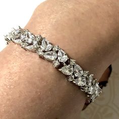 "A gorgeous boho wedding cz bridal bracelet with woodland vines leaves motifs, made of top grade clear cubic zirconia in your choice of white gold silver rhodium, yellow or rose gold plated tarnish-resistant frames. This sparkly, elegant and trendy diamond-alternative jewelry has flexible joints. Bracelet is 8mm wide. Length options: - 6\" (15cm), secures with a snap clasp - 6.5\" up to 8\" (20cm), 6\" min plus an extender, secures with a spring clasp View matching items athttps://etsy.me/2vn08h Dazzling Bracelet With Sparkling Stones For Wedding, Dazzling Bracelets With Sparkling Stones For Wedding, Dazzling Wedding Bracelet With Sparkling Stones, Wedding Diamond Bracelet With Diamond Accents, Wedding Diamond Bracelet With Sparkling Stones In Diamond White, Diamond White Wedding Bracelet With Sparkling Stones, Wedding Crystal Bracelet In Diamond White, Dazzling Diamond Bracelet With Sparkling Stones For Wedding, Wedding Bracelets In Diamond White Cubic Zirconia