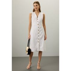 Off-white striped (Shell: 53% Linen, 45% Viscose, 2% Elastane; Lining: 100% Cotton). Casual dress. Sleeveless. V-neck. Back zipper closure. 43" from shoulder to hemline. Imported. Elegant Vertical Stripes Dress For Day Out, Elegant Dresses With Vertical Stripes For Day Out, Striped V-neck Midi Dress For Work, White Midi Dress With Vertical Stripes For Summer, Elegant Knee-length Dress With Vertical Stripes, White Vertical Stripes Dress For Daywear, Chic Vertical Stripe Midi Dress For Work, White Midi Dress With Vertical Stripes, Cotton Casual Dress