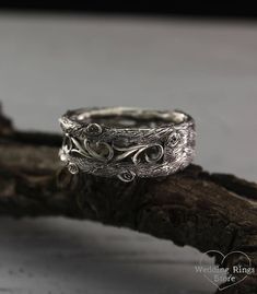 Womens vintage style tree band, Womens unique tree wedding ring, Vine wedding band, Womens tree ring, Wide silver ring, Silver band. ■ All wedding rings are only crafted with the finest of recycled metals DETAILS: Metal - Sterling Silver Dimensions - width 9mm (0.35 in.), Thickness - 1,5mm (0.059 in.) Finish - shiny and oxidized Please choose your ring size and finish in menu while making your order View all tree bands and rings: http://etsy.me/2v9a68V ■ CUSTOM OPTIONS - SIZES AVAILABLE: This ri Unique Antique Silver Wedding Jewelry, Unique Engraved Promise Ring With Intricate Design, Handmade Silver Engraved Ring, Nature-inspired, Rustic Silver Jewelry For Wedding, Rustic Hand Forged Wedding Rings, Handmade Nature-inspired Silver Engraved Ring, Antique Silver Wedding Ring Jewelry, Rustic Sterling Silver Jewelry For Anniversary, Sterling Silver Engraved Ring With Carved Details For Wedding