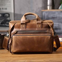 Full Grain Leather Laptop Bag Briefcase Leather Messenger Bag For Men Retro Leather Satchel Portfolio A Full grain leather briefcase that expresses perfect harmony between hard and soft. Top-quality full grain leather gives a sentimental feel, but the lines convey a light touch of modern. Timeless and current. Urban practicality with charisma.Briefcases for men are more than an accessory. A leather briefcase bag is an extension of who you are and what you believe in. When we craft leather briefc