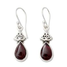 Garnet is dazzling in its crimson splendor. Set in silver the gems grace ornate earrings from Neeru Goel. .925 Sterling silver Ornate Sterling Silver Gemstone Earrings, Ornate Gemstone Earrings In Sterling Silver, Ornate Sterling Silver Teardrop Earrings For Gift, Ornate Sterling Silver Teardrop Earrings As Gift, Elegant 925 Stamped Drop Earrings, Elegant Drop Earrings Stamped 925, Classic Silver Ruby Earrings, Ornate Garnet Filigree Jewelry, Ornate Filigree Garnet Jewelry