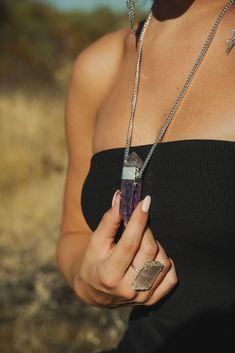 "This large Amethyst crystal necklace is the one you've been dreaming of. It's a statement necklace like no other with it's beautiful double-terminated Amethyst gemstone and silver curb chain! Amethyst, known as the Stone of Spiritual Wisdom, is believed to enhance intuition, calm the mind, and foster a sense of inner peace. Wearing this beauty not only elevates your style but invites the harmonizing influence of Amethyst into your daily life.  ▲ Double-terminated Amethyst gemstone pendant approximately 3\" in length x .75\" in width ▲ Silver curb chain 4 x 5mm ▲ Handmade in Arizona Also available in gold | model wears 24\" necklace. Please use sizing guide below to confirm the length you need.  Want to see more crystal necklaces? https://etsy.me/3hPv5EZ ✦ S I Z I N G ✦ Length is the open Highest Self, Amethyst Crystal Necklace, Curb Chain Necklace, Long Silver Necklace, Silver Necklace Statement, Gold Models, Spiritual Wisdom, Amethyst Necklace, Pendant Silver