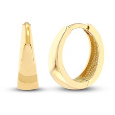 Dynamic tapered tubes are polished to a high shine in these timeless women's hoop earrings. Fashioned in 14K yellow gold, the earrings secure in place with snap-lock backs. 14k Yellow Gold Hinged Earrings, Modern Gold Huggie Earrings For Formal Occasions, 14k Gold Small Hoop Huggie Earrings Hallmarked, Formal Gold Hinged Earrings, Yellow Gold-plated Hoop Earrings With Lever Back, Classic Gold Hinged Earrings, Yellow Gold Plated Hoop Earrings With Lever Back, Fine Jewelry Yellow Gold Huggie Earrings With Polished Finish, Small Hinged Hoop Earrings In Yellow Gold