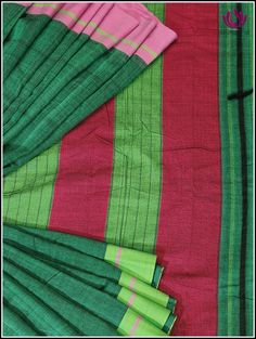 Patteda Anchu sarees are handwoven Handloom sarees from in and around the Villages of Gajendragarh,Karnataka. The saree is name after it’s border and checks pattern is also know as Dundina seraa, devaru seraa,laxmi seraa or pooja seraa. This Patteda Anchu saree is certified with a Handloom Mark and is perfect for the summer weather. It is lightweight for comfort and features a Green body with a Ganga Jamuna border in pink and Green . The modern yet elegant design makes any outing special and inc Green Saree With Weaving Work For Festivals, Green Handloom Cotton Silk Saree, Green Cotton Silk Handloom Saree, Green Cotton Saree With Zari Weaving, Green Cotton Saree With Traditional Patterns, Green Saree With Border In Traditional Drape, Green Cotton Handloom Saree, Green Cotton Traditional Wear With Zari Weaving, Cotton Saree With Border For Traditional Ceremonies