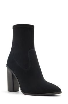 A stretchy shaft adds modern appeal and comfortable wear to a cushioned bootie framed by an almond toe and stacked block heel. 5 1/2" shaft 4" heel Side zip closure Cushioned footbed Leather and textile upper/recycled polyester, textile and synthetic lining/synthetic sole Imported Heeled Boots With 4-inch Block Heel, Heeled Boots With 4-inch Block Heel In Medium Width, Trendy Medium Width Heeled Boots With 4-inch Heel, Night Out Heeled Boots With Stacked Heel, Wide Calf Stacked Heel Boots For Night Out, Fitted Mid-calf Boots With Stacked High Heel, Trendy Boots With 4-inch Block Heel, Fitted Ankle Platform Boots With Stacked Heel, Modern Block Heel Boots For Night Out