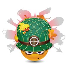 an orange wearing a green hat with flowers on it