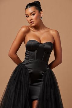 Available In Black And White. Corset Tulle Gown Tube Padded Bra Cups High Low Skirt Hidden Back Zipper Lined Partial Stretch Shell1: 100% Polyester Shell2: 100% Nylon Lining1: 95% Polyester 5% Spandex Lining2: 100% Polyester Imported | Zoee Corset Tulle Gown Dress in Black size XL by Fashion Nova Black Satin Corset Dress For Wedding, Fitted Black Tulle Dress, Fitted Black Dress With Tulle Skirt, Black Fitted Dress With Tulle Skirt, Black Tulle Mini Dress For Cocktail, Black Mini Length Corset Dress For Wedding, Fitted Corset Dress With Tulle Skirt For Cocktail, Black Mini Dress With Sheer Bodice For Cocktail, Black Fitted Mesh Dress For Prom