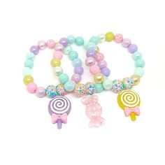 These adorable bracelets are the perfect favor for your little one's macaroon themed party! Each bracelet features a pastel resin macaroon charm, resin rhinestone beads and an assortment of pastel 10mm acrylic beads strung with durable stretch floss cord. You will receive a mix of charm colors. Each bracelet will arrive individually packaged in organza bags. Please select the number of bracelets and bracelet size needed from the drop down menu. Please message me if you have any questions. These Kawaii Hypoallergenic Jewelry For Birthday, Kawaii Hypoallergenic Jewelry For Birthdays, Pink Novelty Stretch Bracelet For Birthday, Novelty Pink Stretch Bracelet For Birthday, Playful Pink Jewelry For Easter, Sweet Handmade Beaded Bracelets For Birthday, Whimsical Adjustable Beaded Bracelets For Party, Pink Novelty Bracelets For Party Favors, Pink Plastic Jewelry For Birthday