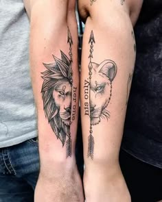 two people with tattoos on their arms holding each other's hands and one has a lion