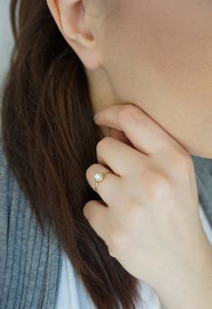 14K 9K Gold Solitaire Pearl Ring, Minimalist pearl ring, Dainty pearl ring, Stacking ring, Promise ring, Engagement ring, Gift for her, 14K Rose gold ring, Gift for her, Anniversary ring, FREE EXPRESS SHIPPING Beautiful and delicate white pearl ring made in 14K or 9K solid gold. The pearl is natural and not colored. Whisper...Always on trend! ;) -------------------------------------------------- D E T A I L S 14K or 9K Solid Gold Natural White Pearl 5mm Band width 1.4mm ------------------------- Minimalist Pearl Drop Ring For Wedding, Minimalist Wedding Pearl Ring With Pearl Drop, Minimalist Pearl Drop Ring For Anniversary, Simple Pearl Ring For Wedding, Minimalist Pearl Rings With Pearl Charm, Elegant Everyday Pearl Open Ring, Minimalist Pearl Drop Ring For Promise, Minimalist Pearl Ring For Anniversary, Minimalist Pearl Drop Ring